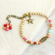Our Lady of Guadalupe Bronze Tone Bracelet with 4mm Pink and White Wooden Beads and Charm * (Minimum quantity purchase is 1)