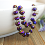 Our Lady of Fatima Rosary with 10 x 8mm Metallic Purple Rondelle Beads and Holy Trinity Crucifix - 21"   (Minimum quantity purchase is 1)