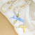 Our Lady of Lourdes Rosary with Blue and White Wooden Beads - 16 1/2