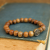 Saint Benedict Wood Bead Stretch Unisex Bracelet  (Minimum quantity purchase is 1)